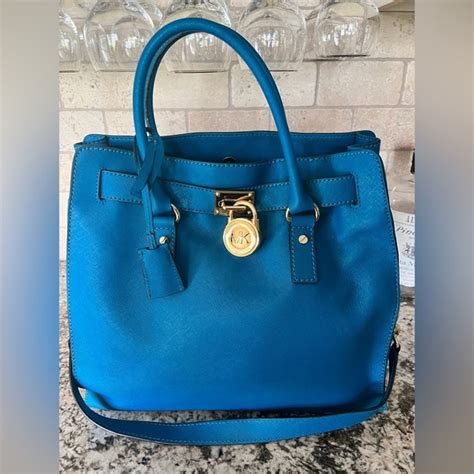 michael kors logo handbags|michael kors teal handbag.